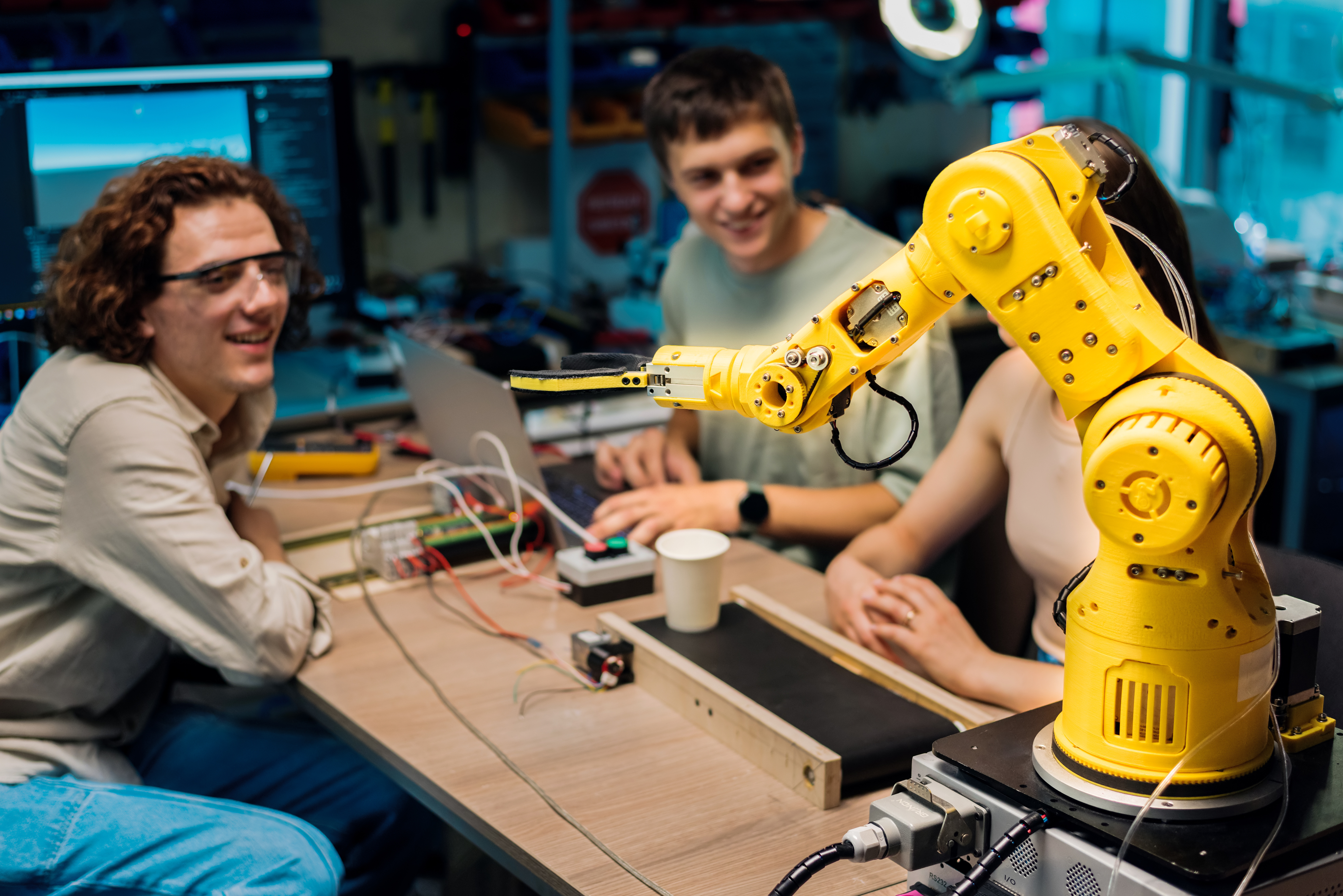 Engineers collaborating on robotics research